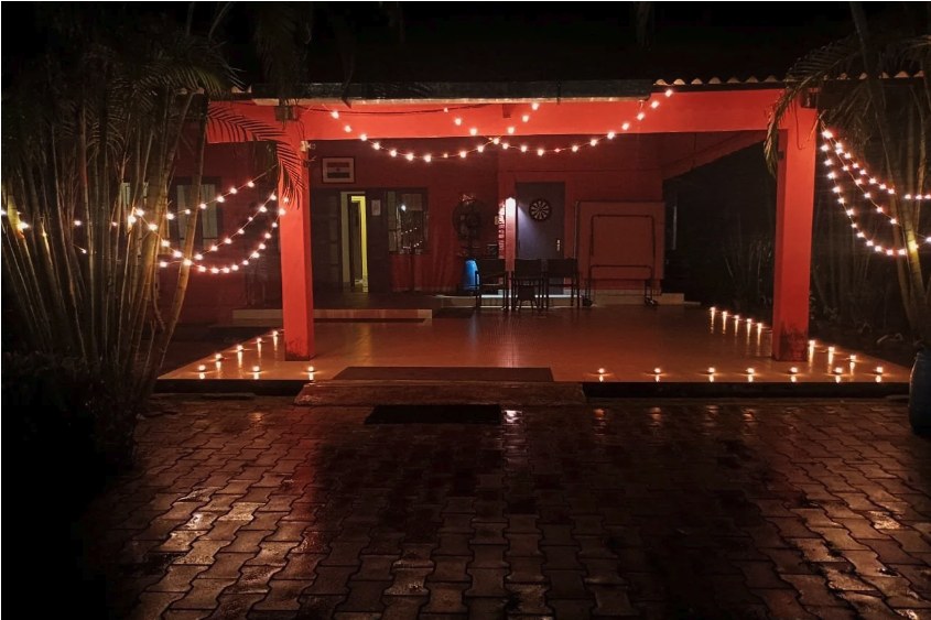 The courtyard at Chai Seed Resorts lit up at night